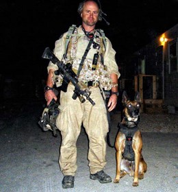 James (Founder) pictured with K9 Spike. Our logo was formed from this photo.